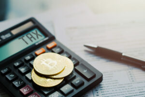 Kryptowalutowe giełdy i podatki: Jak rozliczać transakcje i zyski